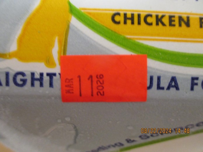 Close up of best used by date for Answers Pet Food Straight Chicken Formula for Dogs; UPC/bar code number: 856554002065; BUBD: Mar 11 2026