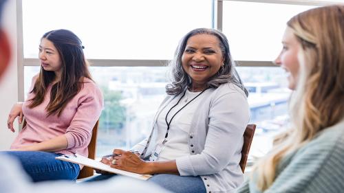 Diverse women discussing in small group