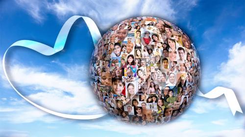 Graphic of a globe covered in faces of people around the world floating in a blue sky with a cancer ribbon wrapping around the globe.