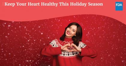 Holiday themed image with young woman holding up her hands in shape of a heart