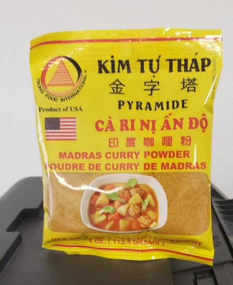 Front of Kim Tu Thap Madras Curry Powder bag, 4 oz