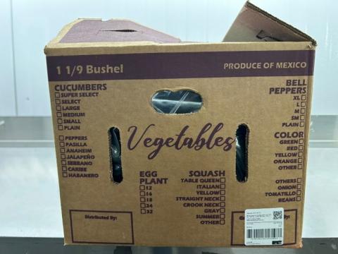 “Image one of bulk cardboard box holding bulk cucumbers”