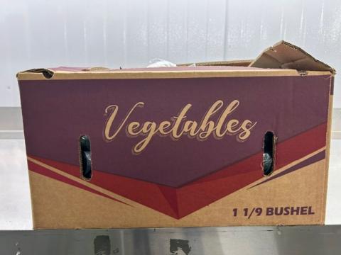 “Image two of bulk cardboard box holding bulk cucumbers”